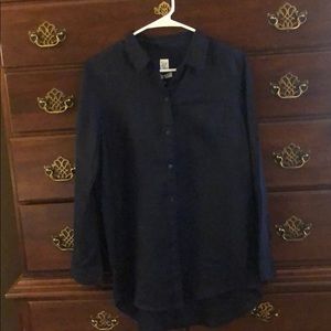 Long sleeve linen blouse .